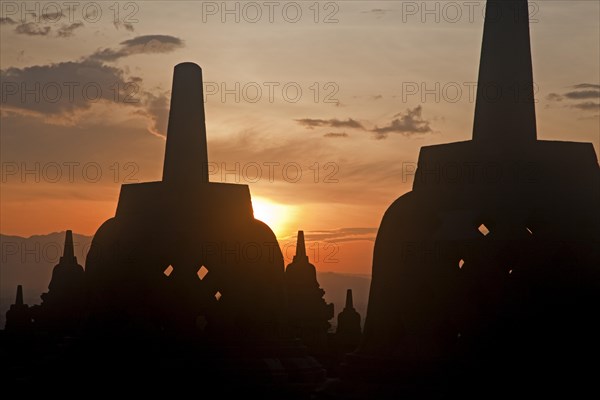 Silhouetted stupas of Borobudur