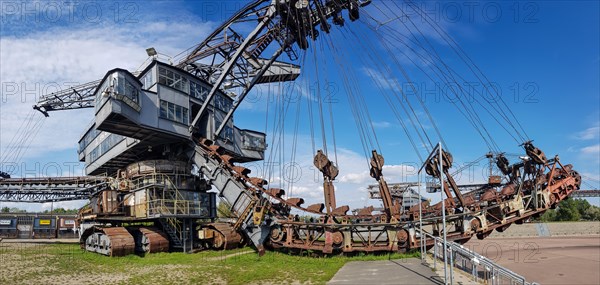 Panoramic photo of lignite excavator giants at the Ferropolis Industrial Heritage Open-Air Museum
