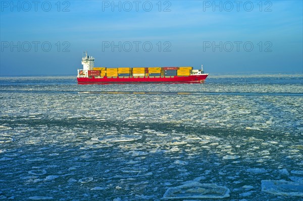 Container freighter on the Lower Elbe near Cuxhaven
