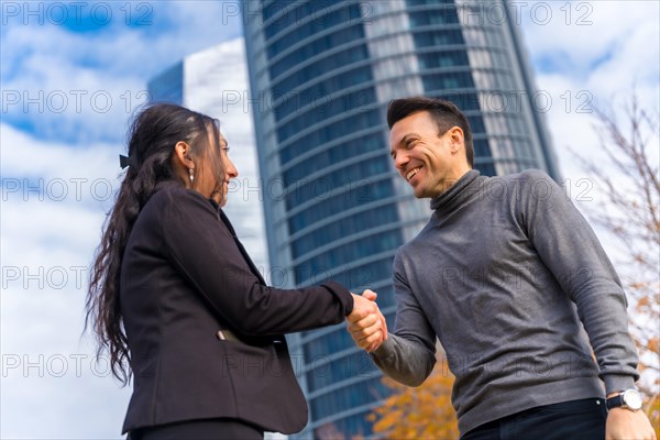 Multi-ethnic businessman and businesswoman