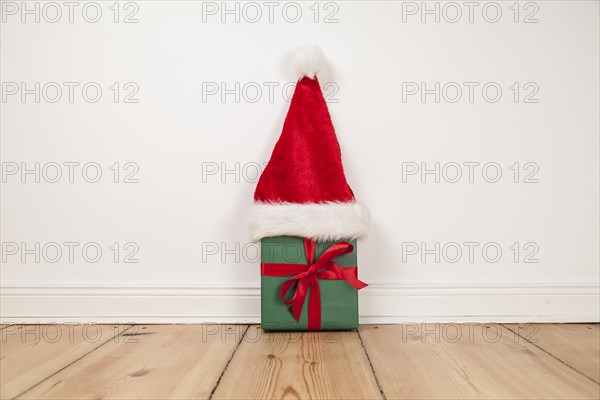 Wrapped gift with Christmas hat