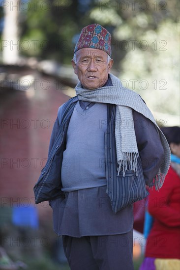 Nepali with Dhaka Topi National Cap