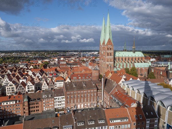 City panorama from the viewing platform of the Protestant Church of St. Peter in Luebeck towards the Protestant Church of St. Mary