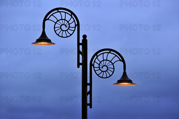 Ammonite-design streetlamp along the promenade at Lyme Regis