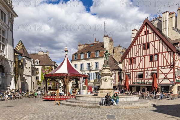 Fountains and restaurants at Place Francois Rude in the old town