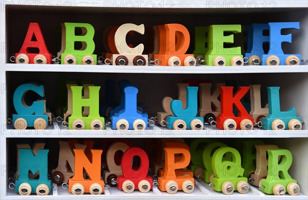 Alphabet letters on small trolley to play with