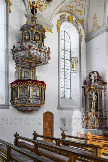 Pulpit and side altar