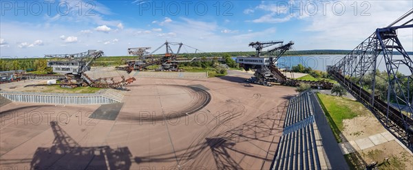 Panoramic photo of lignite excavator giants at the Ferropolis Industrial Heritage Open-Air Museum