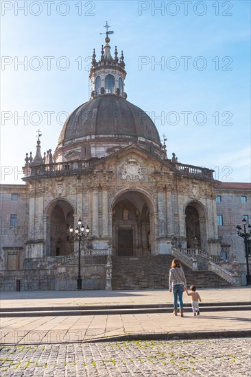 Mother and son tourists visiting the Sanctuary of Loyola