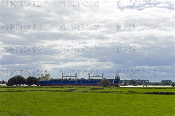 Heavy-lift project carrier on the Weser near Bremen Farge