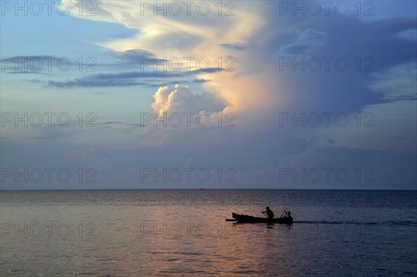 Fisherman in Indonesian jukung