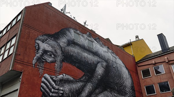 Mural on red house wall