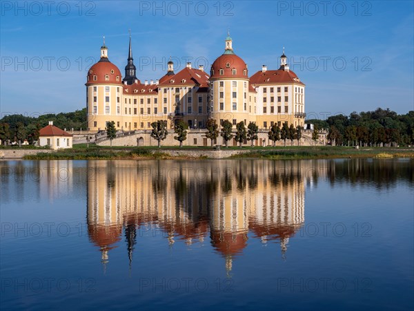 Hunting and baroque castle Moritzburg in the middle of castle pond lake