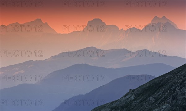 Aerial view from the mountain peak Edelweisspitze towards Zell am See at sunset