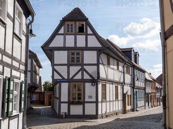 Narrow half-timbered house stage head in the narrow Marktstrasse