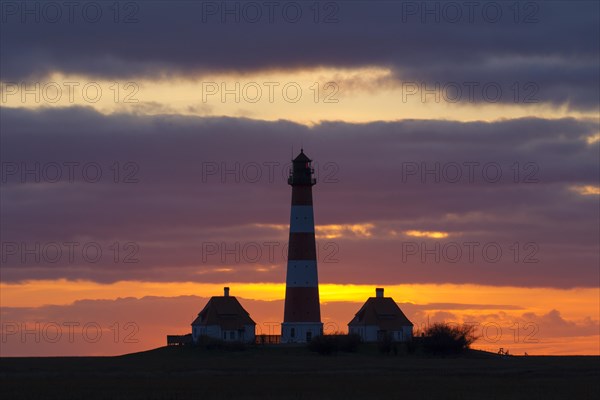 Lighthouse Westerheversand at sunset at Westerhever