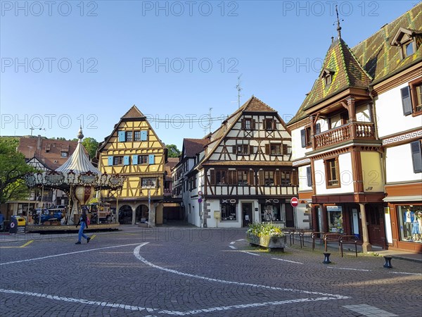 Carousel Carousel Adam and half-timbered houses in the square Pl. de l'Etoile