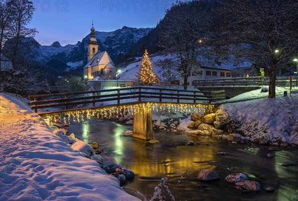 Winterly parish church St. Sebastian at blue hour