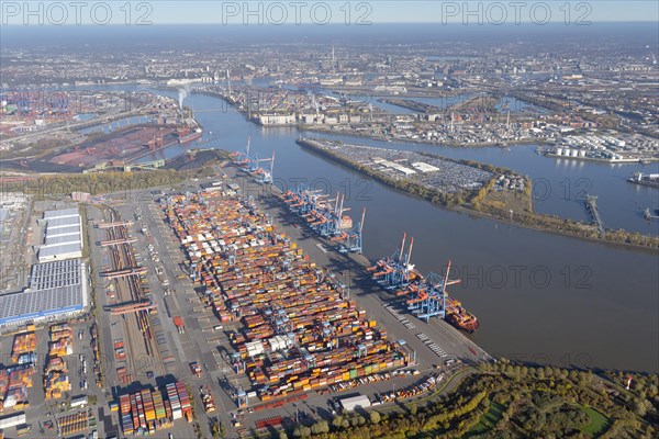 Aerial view of the Container Terminal Altenwerder behind it the city centre of Hamburg
