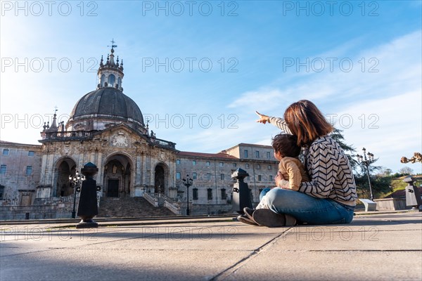 Mother and son looking at the Sanctuary of Loyola