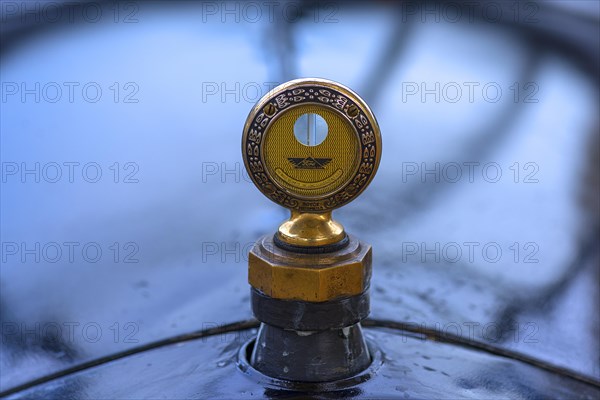 Ford symbol on the bonnet of a vintage Ford from 1936