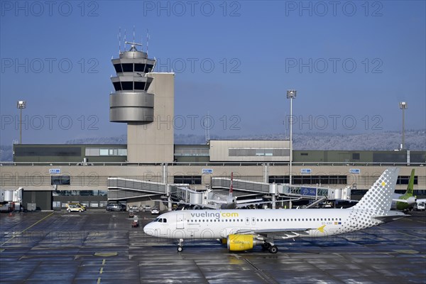 Control tower and aircraft Vueling