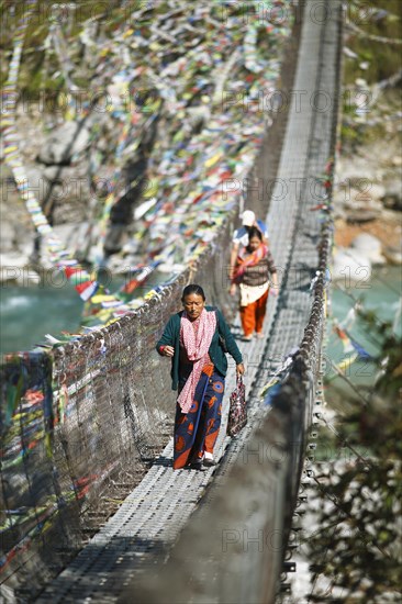 Prayer flags at the suspension bridge over the Seti River