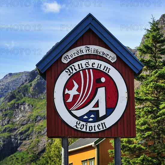 Wooden sign at the entrance