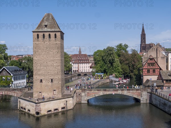 The Ponts Couverts de Strasbourg bridge over the Ill and the Hans von Altheim tower and in the background Cathedral