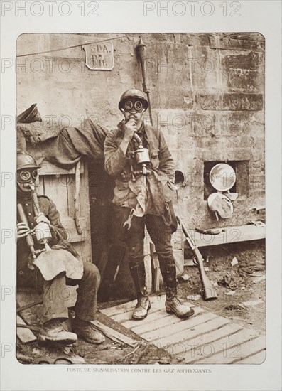 Soldiers with gas masks near bunker in Flanders during the First World War