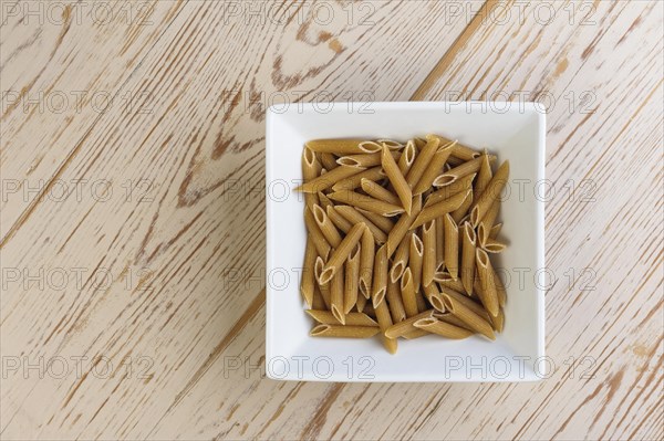 Bowl of wholewheat penne pasta