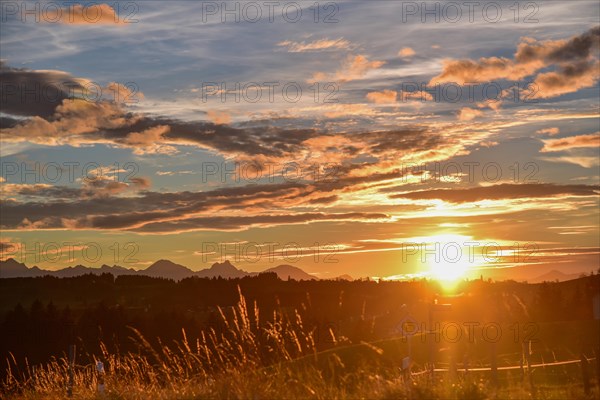 Sunset near Rottenbuch in Pfaffenwinkel with a view of the Allgaeu mountains