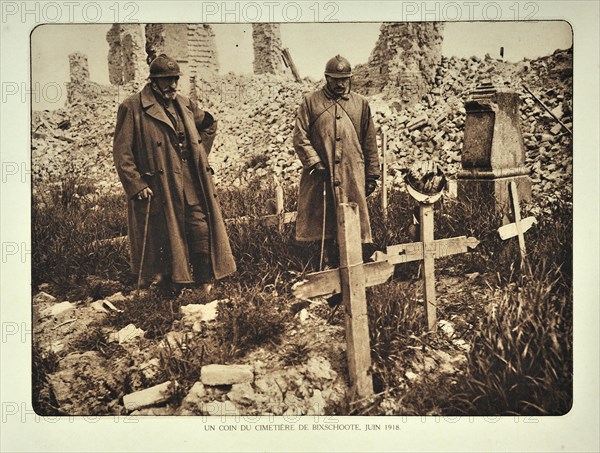 Officers visiting improvised graves at the ruined village Bikschote in Flanders during the First World War