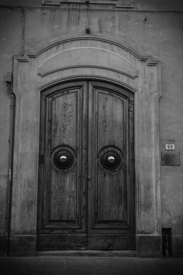 Doorway along cobbled street