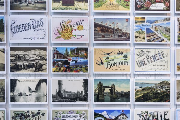 Collection of international vintage postcards of the early 20th century showing drawings and old photographs of holiday destinations