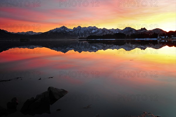 Sunset at the Forggensee with view of the Saeuling near Fuessen