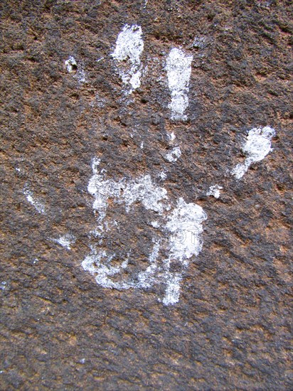 Handprint on stone