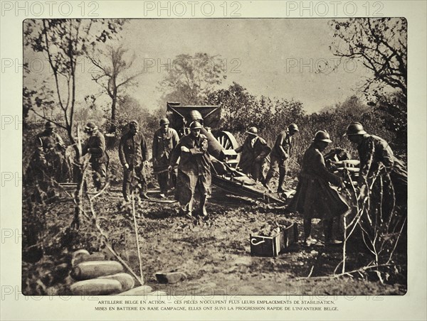 Artillery soldiers firing cannon at battlefield in Flanders during the First World War