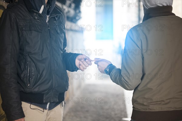 Young people dealing drugs