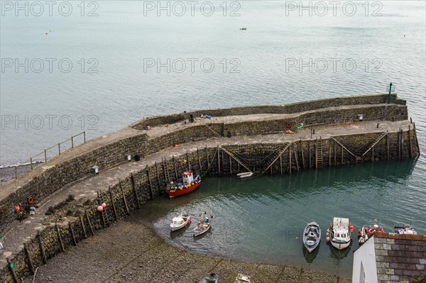 Looking down at the harbour and wall