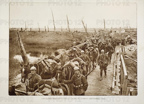 Cavalry heading for the battlefield through bombarded terrain in Flanders during the First World War