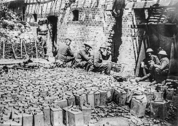 WWI British soldiers with jerrycans at water-filled petrol tin dump at Elverdinghe