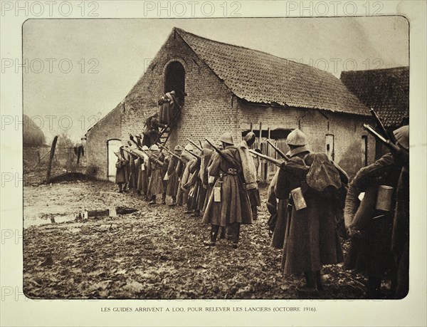Soldiers arrive at Lo and enter stable to sleep in Flanders during the First World War