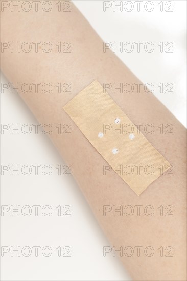 Plaster on arm