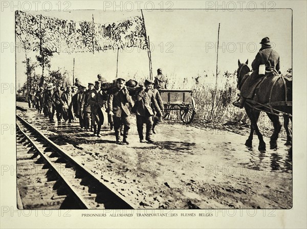 German prisoners evacuating wounded Belgian soldiers on stretchers in Flanders during the First World War