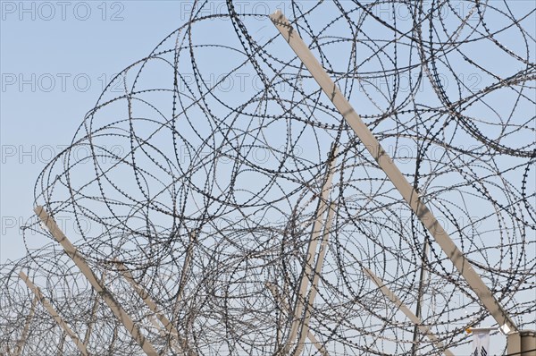 Razor wire on top of the DMZ