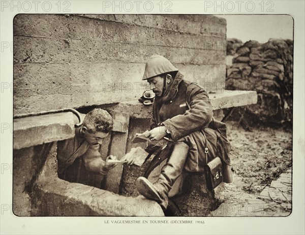Soldier receiving letter from the postman