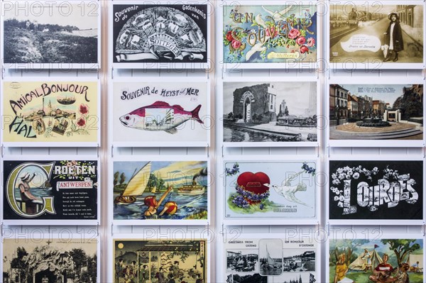 Collection of vintage postcards of the early 20th century showing drawings and old photographs of holiday destinations