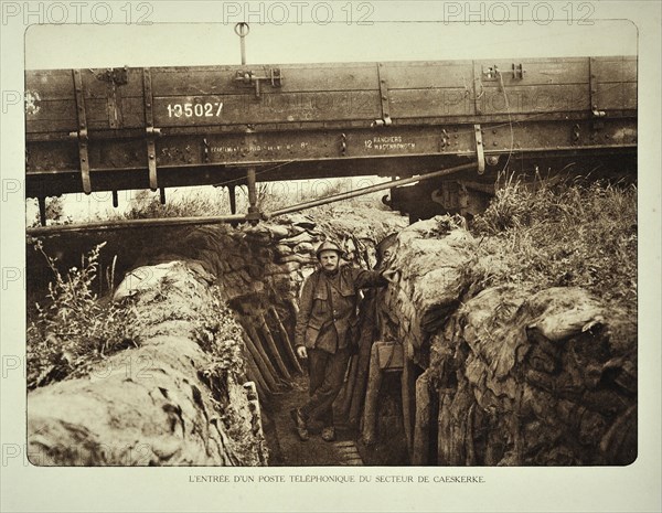 Soldier in trench at communication post under train wagon at Kaaskerke in Flanders during the First World War