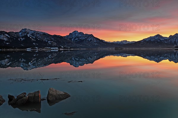 Sunset at the Forggensee with view of the Saeuling near Fuessen